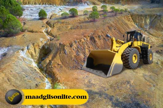 Water drainage in bitumen mines by loader